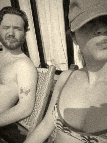Joris and Mariana squinting in the sun
