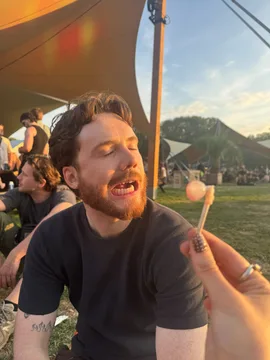 Joris laughing at a festival