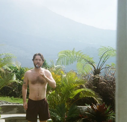 Joris on film, in a garden below a volcano