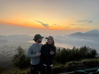 Joris and Mariana at sunrise above the clouds